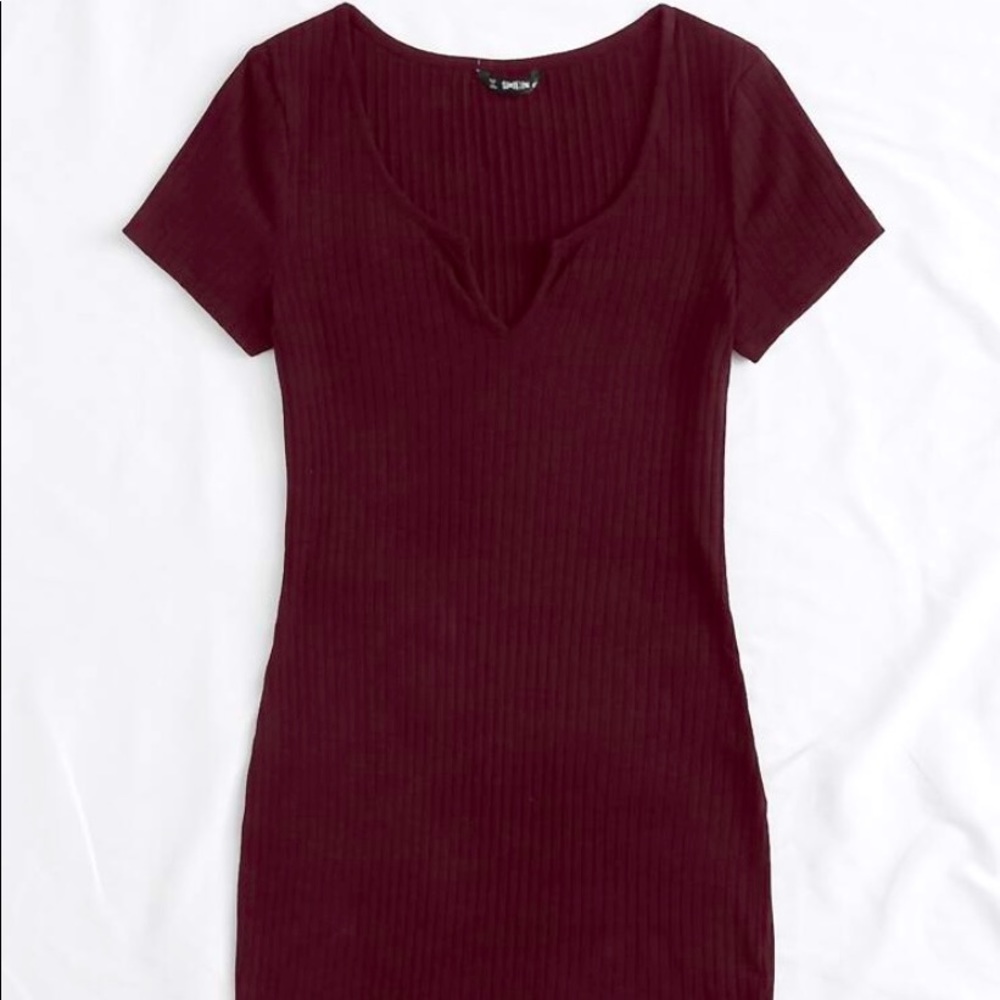 This is a burgundy body con dress from shein